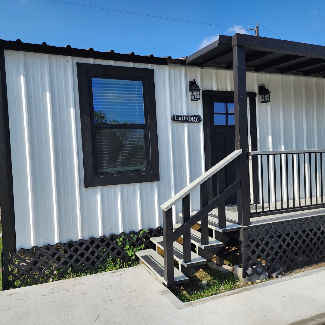 Covered porch entrance to the laundry room